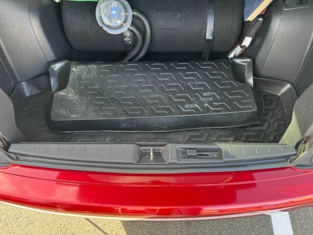 Красный Мицубиси Аутлендер, объемом двигателя 2 л и пробегом 269 тыс. км за 8700 $, фото 10 на Automoto.ua