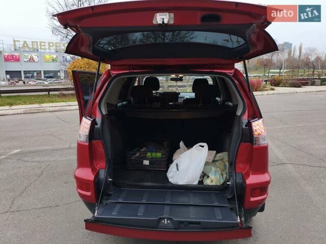 Красный Мицубиси Аутлендер, объемом двигателя 2.36 л и пробегом 93 тыс. км за 11499 $, фото 16 на Automoto.ua