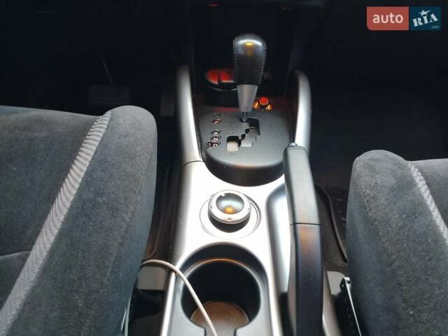 Красный Мицубиси Аутлендер, объемом двигателя 2.36 л и пробегом 93 тыс. км за 11499 $, фото 41 на Automoto.ua