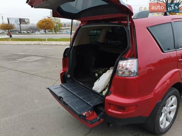 Красный Мицубиси Аутлендер, объемом двигателя 2.36 л и пробегом 93 тыс. км за 11499 $, фото 14 на Automoto.ua