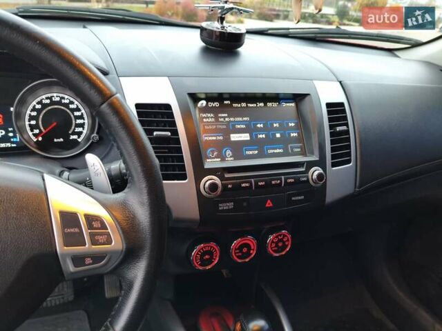 Красный Мицубиси Аутлендер, объемом двигателя 2.36 л и пробегом 93 тыс. км за 11499 $, фото 31 на Automoto.ua