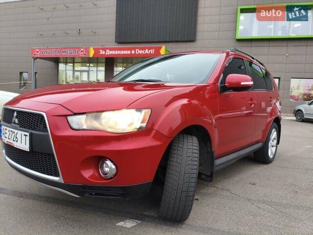 Красный Мицубиси Аутлендер, объемом двигателя 2.36 л и пробегом 93 тыс. км за 11499 $, фото 3 на Automoto.ua