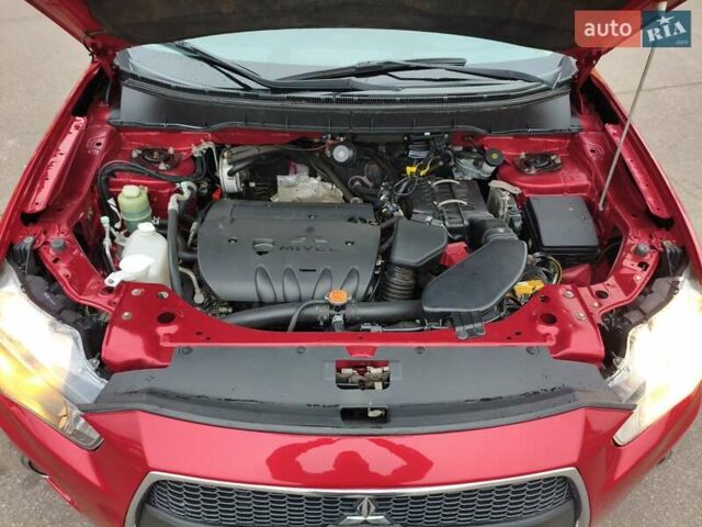 Красный Мицубиси Аутлендер, объемом двигателя 2.36 л и пробегом 93 тыс. км за 11499 $, фото 36 на Automoto.ua