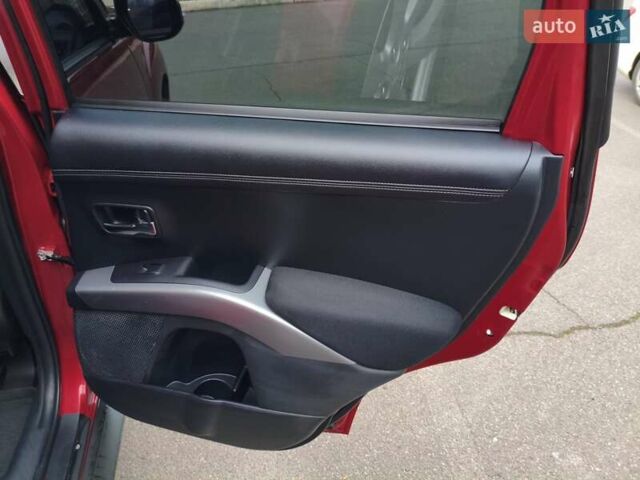 Красный Мицубиси Аутлендер, объемом двигателя 2.36 л и пробегом 93 тыс. км за 11499 $, фото 22 на Automoto.ua