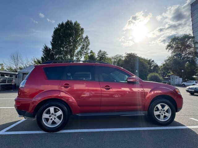 Красный Мицубиси Аутлендер, объемом двигателя 2 л и пробегом 269 тыс. км за 8700 $, фото 4 на Automoto.ua