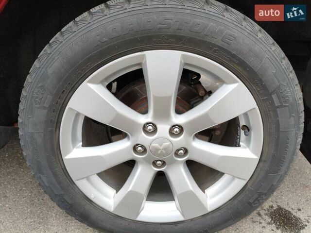 Красный Мицубиси Аутлендер, объемом двигателя 2.36 л и пробегом 93 тыс. км за 11499 $, фото 33 на Automoto.ua