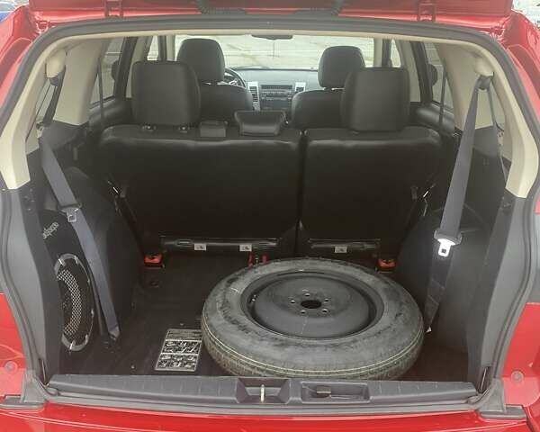 Красный Мицубиси Аутлендер, объемом двигателя 2.36 л и пробегом 210 тыс. км за 11800 $, фото 9 на Automoto.ua