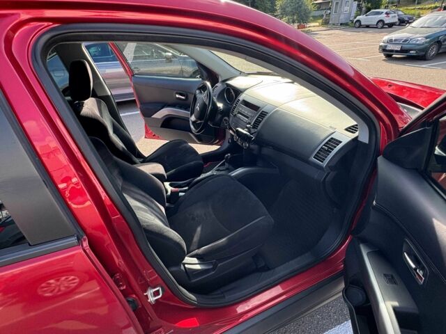 Красный Мицубиси Аутлендер, объемом двигателя 2 л и пробегом 269 тыс. км за 8700 $, фото 8 на Automoto.ua