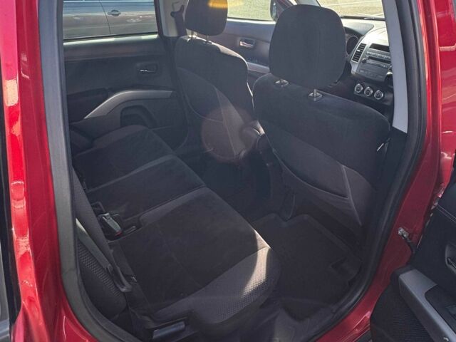 Красный Мицубиси Аутлендер, объемом двигателя 2 л и пробегом 269 тыс. км за 8700 $, фото 9 на Automoto.ua