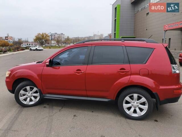 Красный Мицубиси Аутлендер, объемом двигателя 2.36 л и пробегом 93 тыс. км за 11499 $, фото 13 на Automoto.ua