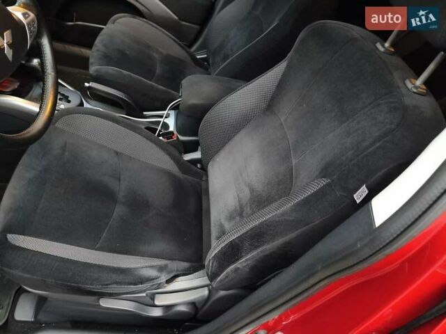 Красный Мицубиси Аутлендер, объемом двигателя 2.36 л и пробегом 93 тыс. км за 11499 $, фото 19 на Automoto.ua