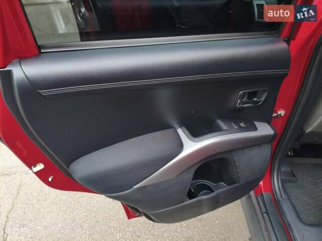 Красный Мицубиси Аутлендер, объемом двигателя 2.36 л и пробегом 93 тыс. км за 11499 $, фото 20 на Automoto.ua