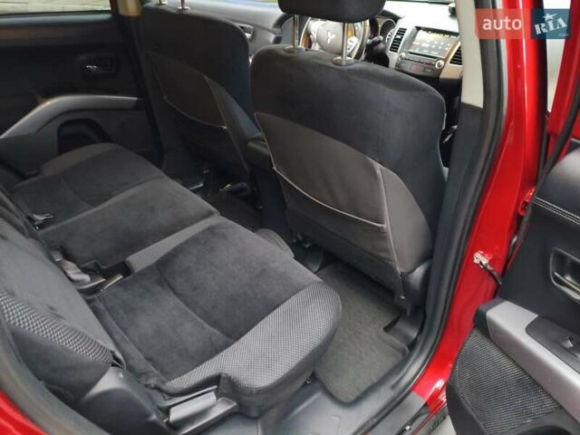 Красный Мицубиси Аутлендер, объемом двигателя 2.36 л и пробегом 93 тыс. км за 11499 $, фото 23 на Automoto.ua