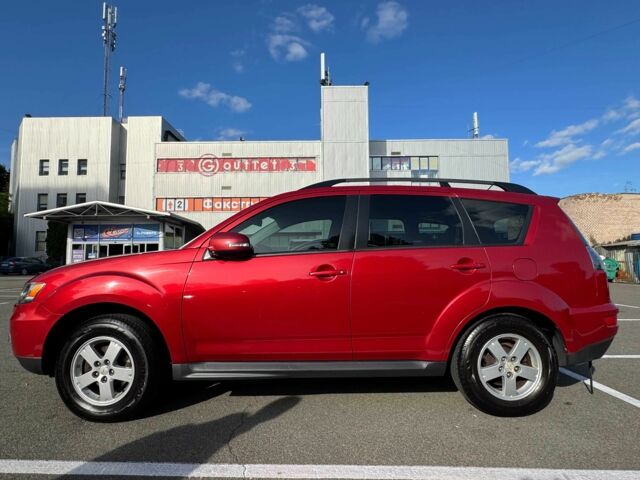 Красный Мицубиси Аутлендер, объемом двигателя 2 л и пробегом 269 тыс. км за 8700 $, фото 3 на Automoto.ua