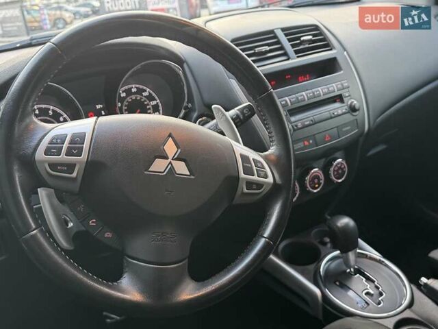 Червоний Міцубісі Аутлендер, об'ємом двигуна 2 л та пробігом 96 тис. км за 10950 $, фото 31 на Automoto.ua