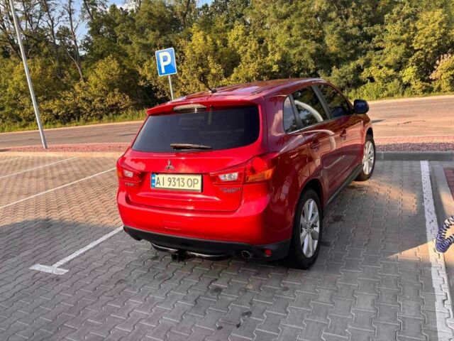 Красный Мицубиси Аутлендер, объемом двигателя 2 л и пробегом 200 тыс. км за 9100 $, фото 4 на Automoto.ua