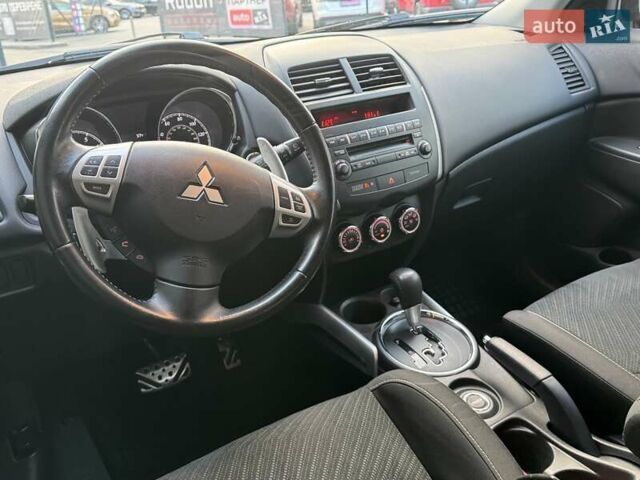 Червоний Міцубісі Аутлендер, об'ємом двигуна 2 л та пробігом 96 тис. км за 10950 $, фото 18 на Automoto.ua