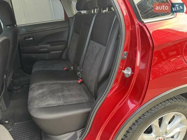 Червоний Міцубісі Аутлендер, об'ємом двигуна 2 л та пробігом 96 тис. км за 10950 $, фото 24 на Automoto.ua