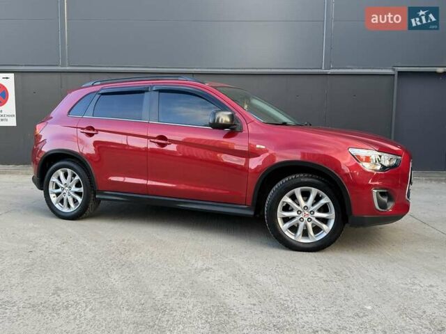 Червоний Міцубісі Аутлендер, об'ємом двигуна 2 л та пробігом 96 тис. км за 10950 $, фото 6 на Automoto.ua