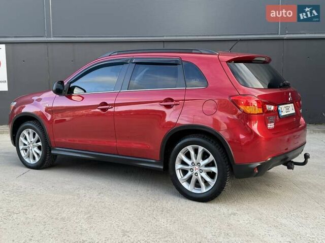 Червоний Міцубісі Аутлендер, об'ємом двигуна 2 л та пробігом 96 тис. км за 10950 $, фото 50 на Automoto.ua