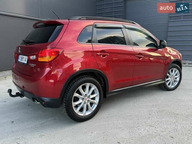 Червоний Міцубісі Аутлендер, об'ємом двигуна 2 л та пробігом 96 тис. км за 10950 $, фото 7 на Automoto.ua