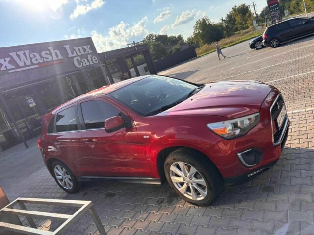 Красный Мицубиси Аутлендер, объемом двигателя 2 л и пробегом 200 тыс. км за 9100 $, фото 8 на Automoto.ua