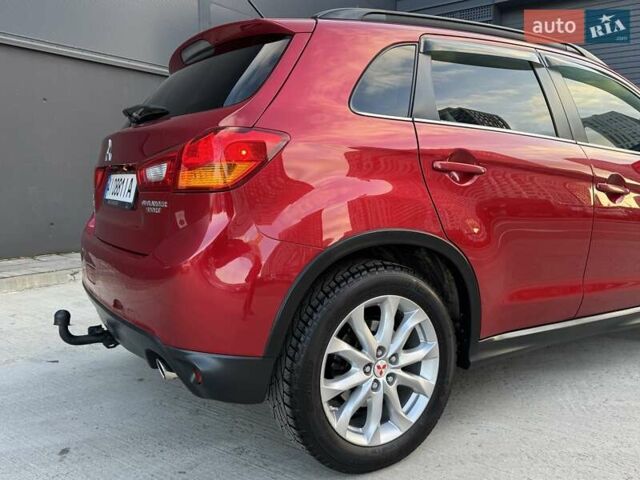 Червоний Міцубісі Аутлендер, об'ємом двигуна 2 л та пробігом 96 тис. км за 10950 $, фото 38 на Automoto.ua