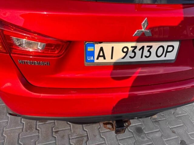 Красный Мицубиси Аутлендер, объемом двигателя 2 л и пробегом 200 тыс. км за 9100 $, фото 5 на Automoto.ua