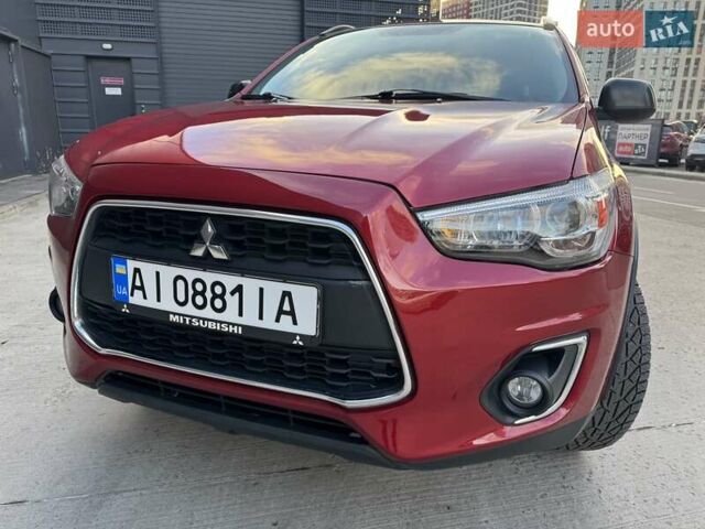 Червоний Міцубісі Аутлендер, об'ємом двигуна 2 л та пробігом 96 тис. км за 10950 $, фото 40 на Automoto.ua