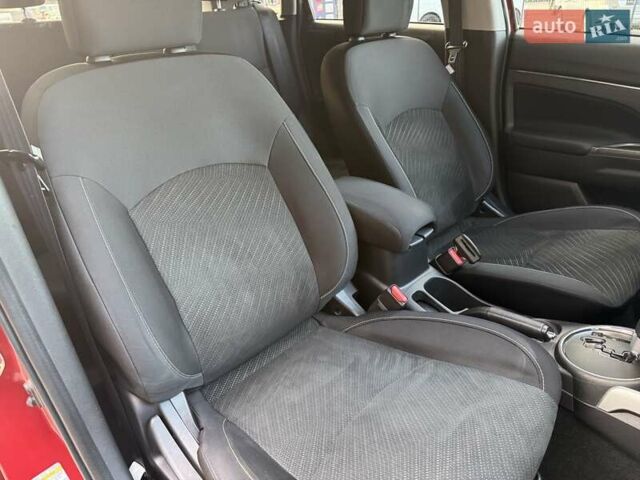 Червоний Міцубісі Аутлендер, об'ємом двигуна 2 л та пробігом 96 тис. км за 10950 $, фото 19 на Automoto.ua