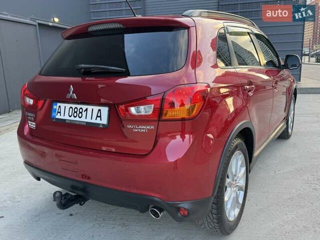 Червоний Міцубісі Аутлендер, об'ємом двигуна 2 л та пробігом 96 тис. км за 10950 $, фото 37 на Automoto.ua