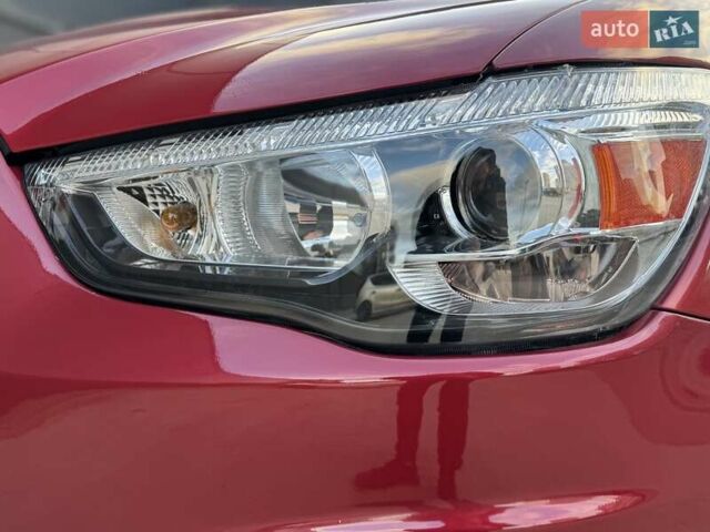 Червоний Міцубісі Аутлендер, об'ємом двигуна 2 л та пробігом 96 тис. км за 10950 $, фото 43 на Automoto.ua