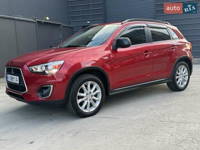 Червоний Міцубісі Аутлендер, об'ємом двигуна 2 л та пробігом 96 тис. км за 10950 $, фото 5 на Automoto.ua