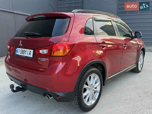 Червоний Міцубісі Аутлендер, об'ємом двигуна 2 л та пробігом 96 тис. км за 10950 $, фото 36 на Automoto.ua