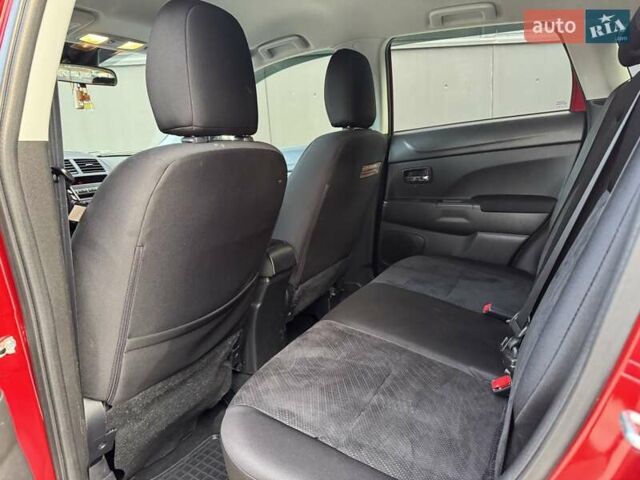 Червоний Міцубісі Аутлендер, об'ємом двигуна 2 л та пробігом 96 тис. км за 10950 $, фото 23 на Automoto.ua