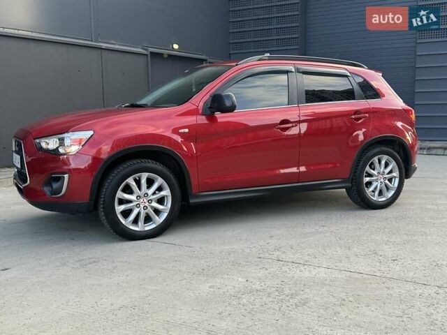 Червоний Міцубісі Аутлендер, об'ємом двигуна 2 л та пробігом 96 тис. км за 10950 $, фото 39 на Automoto.ua