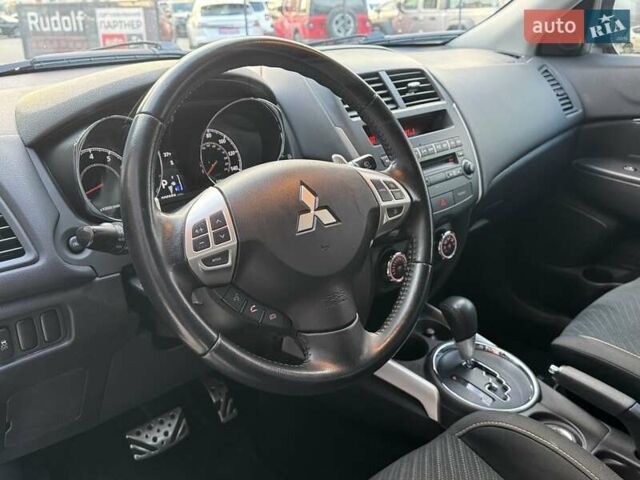 Червоний Міцубісі Аутлендер, об'ємом двигуна 2 л та пробігом 96 тис. км за 10950 $, фото 13 на Automoto.ua