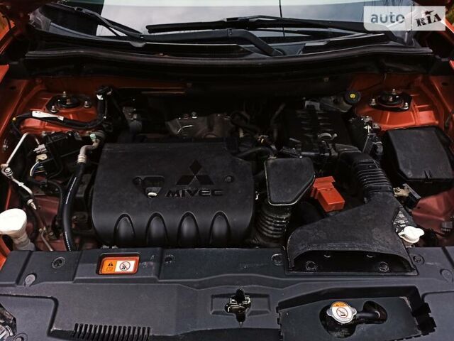Червоний Міцубісі Аутлендер, об'ємом двигуна 2.4 л та пробігом 135 тис. км за 12800 $, фото 22 на Automoto.ua