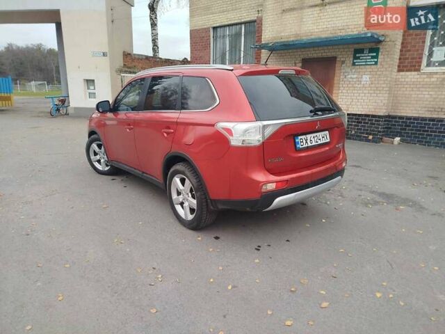 Красный Мицубиси Аутлендер, объемом двигателя 3 л и пробегом 230 тыс. км за 14200 $, фото 4 на Automoto.ua