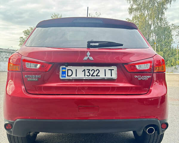 Красный Мицубиси Аутлендер, объемом двигателя 2 л и пробегом 210 тыс. км за 13500 $, фото 7 на Automoto.ua