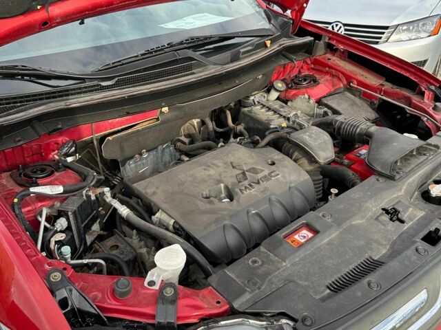 Красный Мицубиси Аутлендер, объемом двигателя 2.4 л и пробегом 213 тыс. км за 11900 $, фото 20 на Automoto.ua