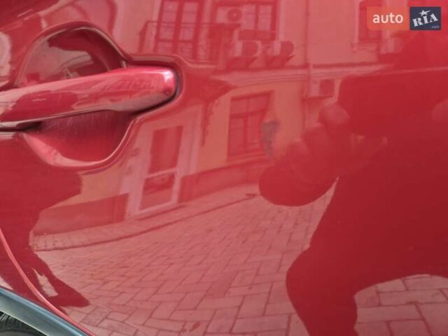 Красный Мицубиси Аутлендер, объемом двигателя 3 л и пробегом 119 тыс. км за 14000 $, фото 19 на Automoto.ua