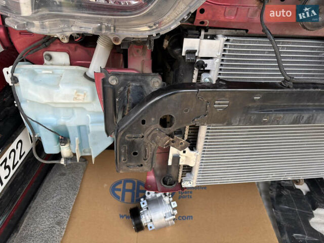 Красный Мицубиси Аутлендер, объемом двигателя 2 л и пробегом 210 тыс. км за 13500 $, фото 21 на Automoto.ua