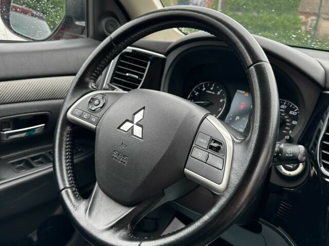 Красный Мицубиси Аутлендер, объемом двигателя 2.4 л и пробегом 213 тыс. км за 11900 $, фото 11 на Automoto.ua