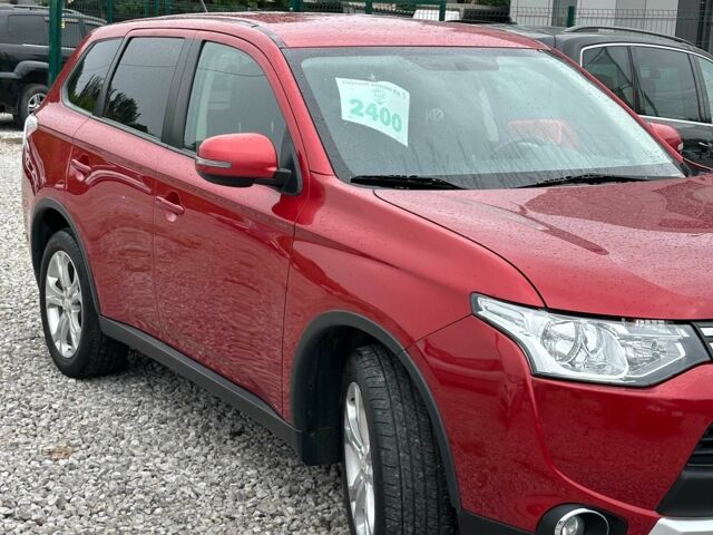 Красный Мицубиси Аутлендер, объемом двигателя 2.4 л и пробегом 213 тыс. км за 11900 $, фото 2 на Automoto.ua