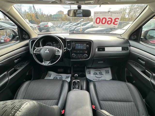 Красный Мицубиси Аутлендер, объемом двигателя 2.4 л и пробегом 213 тыс. км за 11900 $, фото 8 на Automoto.ua