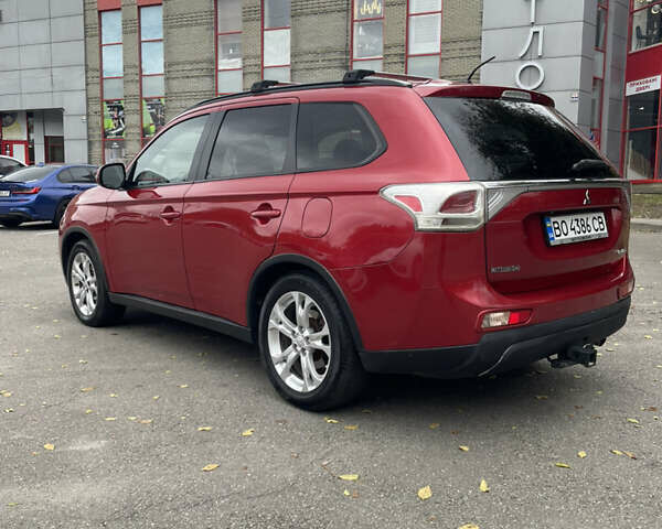 Червоний Міцубісі Аутлендер, об'ємом двигуна 2.36 л та пробігом 149 тис. км за 12500 $, фото 5 на Automoto.ua