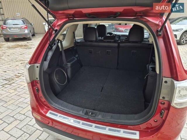 Красный Мицубиси Аутлендер, объемом двигателя 3 л и пробегом 119 тыс. км за 14000 $, фото 14 на Automoto.ua