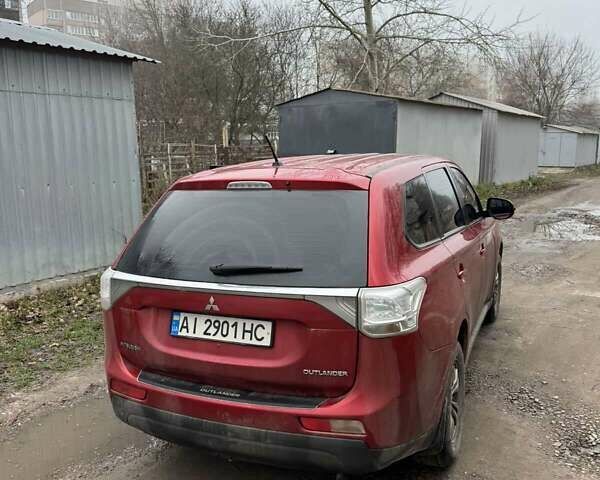 Красный Мицубиси Аутлендер, объемом двигателя 2 л и пробегом 96 тыс. км за 15500 $, фото 3 на Automoto.ua
