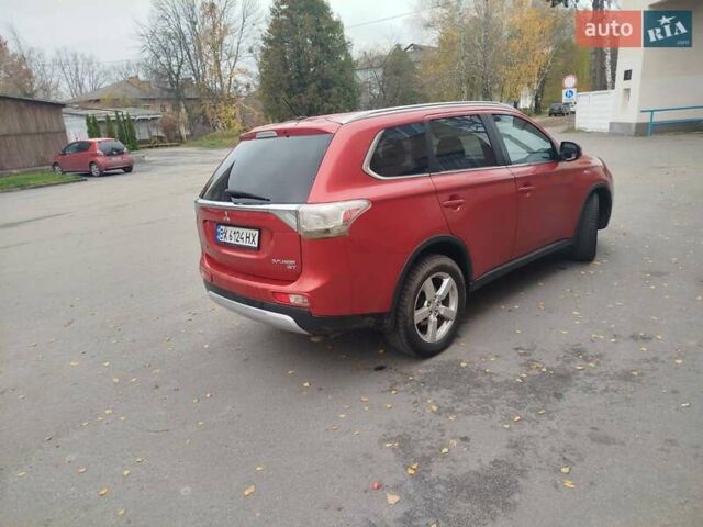 Красный Мицубиси Аутлендер, объемом двигателя 3 л и пробегом 230 тыс. км за 14200 $, фото 5 на Automoto.ua